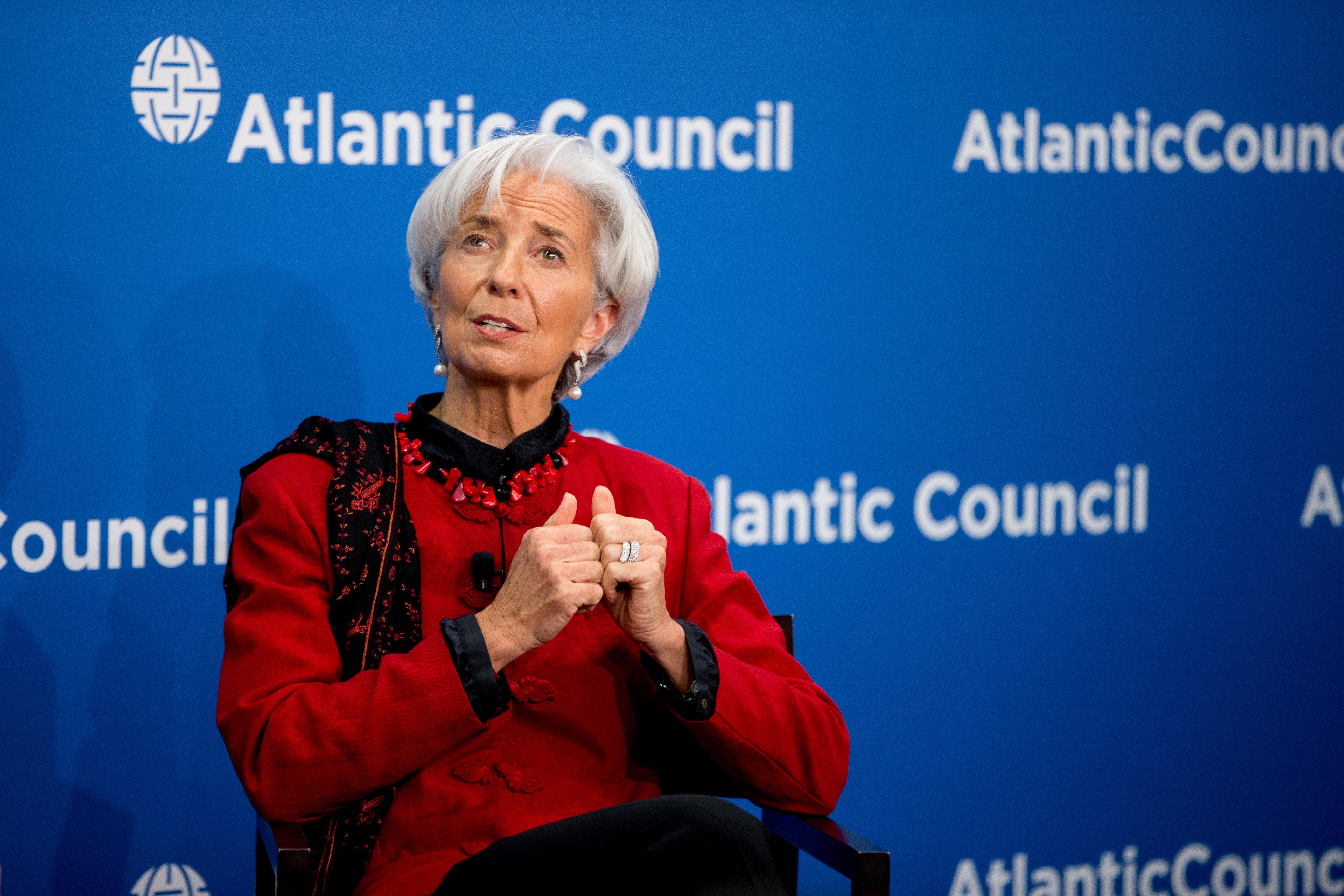 In this Thursday, April 9, 2015 photo, International Monetary Fund Managing Director Christine Lagarde speaks at the Atlantic Council in Washington.  The IMF predicted Tuesday, April 14,  that the American economy will grow 3.1 percent this year and next, a performance the fund characterized as "robust." But the U.S. outlook was down from the IMF's January forecast of 3.6 percent growth in 2015 and 3.3 percent growth in 2016. The American economy advanced 2.4 percent last year.(AP Photo/Andrew Harnik)