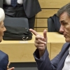 Greek Finance Minister Euclid Tsakalotos, right, speaks with Managing Director of the International Monetary Fund Christine Lagarde during a round table meeting of eurogroup finance ministers at the EU Lex building in Brussels on Sunday, July 12, 2015. Greece has another chance Sunday to convince skeptical European creditors that it can be trusted to enact wide-ranging economic reforms which would safeguard its future in the common euro currency. (AP Photo/Michel Euler)