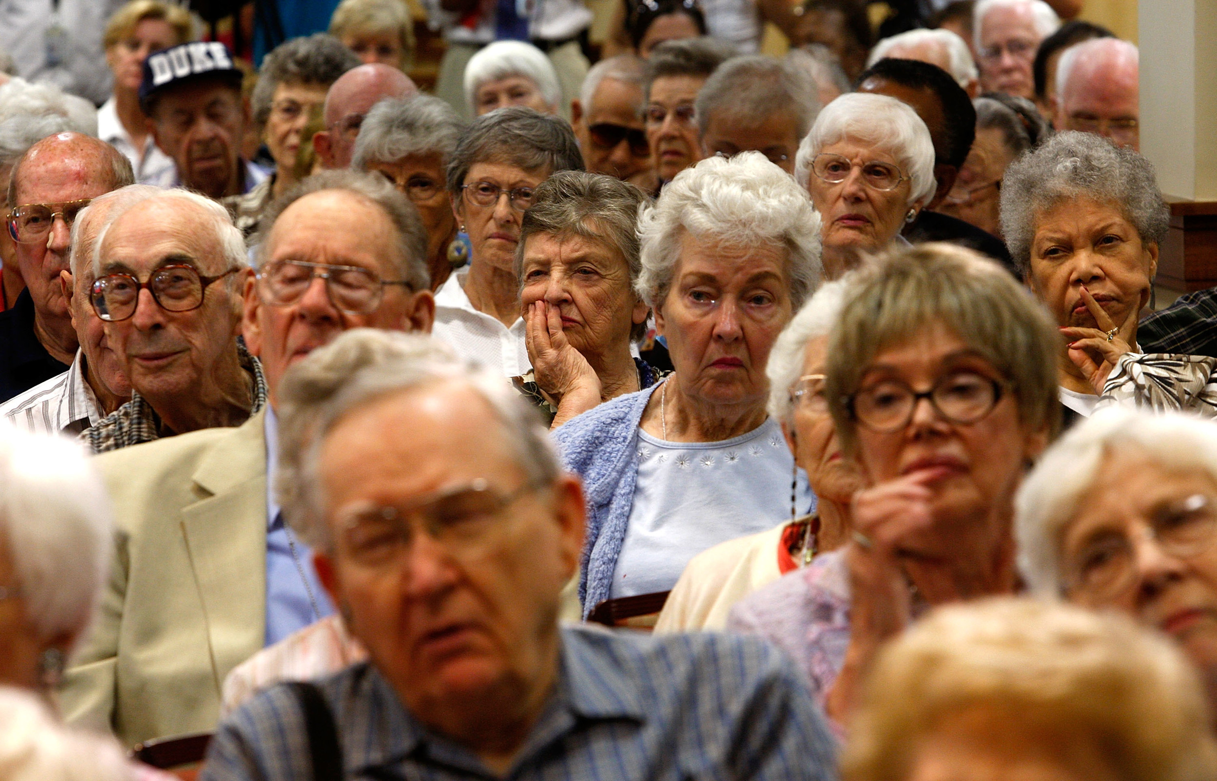 SPRINGFIELD, VA - AUGUST 25:  Residents listen during a health care forum at Greenspring Retirement Community August 25, 2009 in Springfield, Virginia. Congressional members from across the country have returned to their own district to listen to voters' opinions on healthcare reform.  (Photo by Alex Wong/Getty Images)