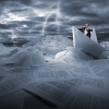 Businessman sailing in stormy papers sea