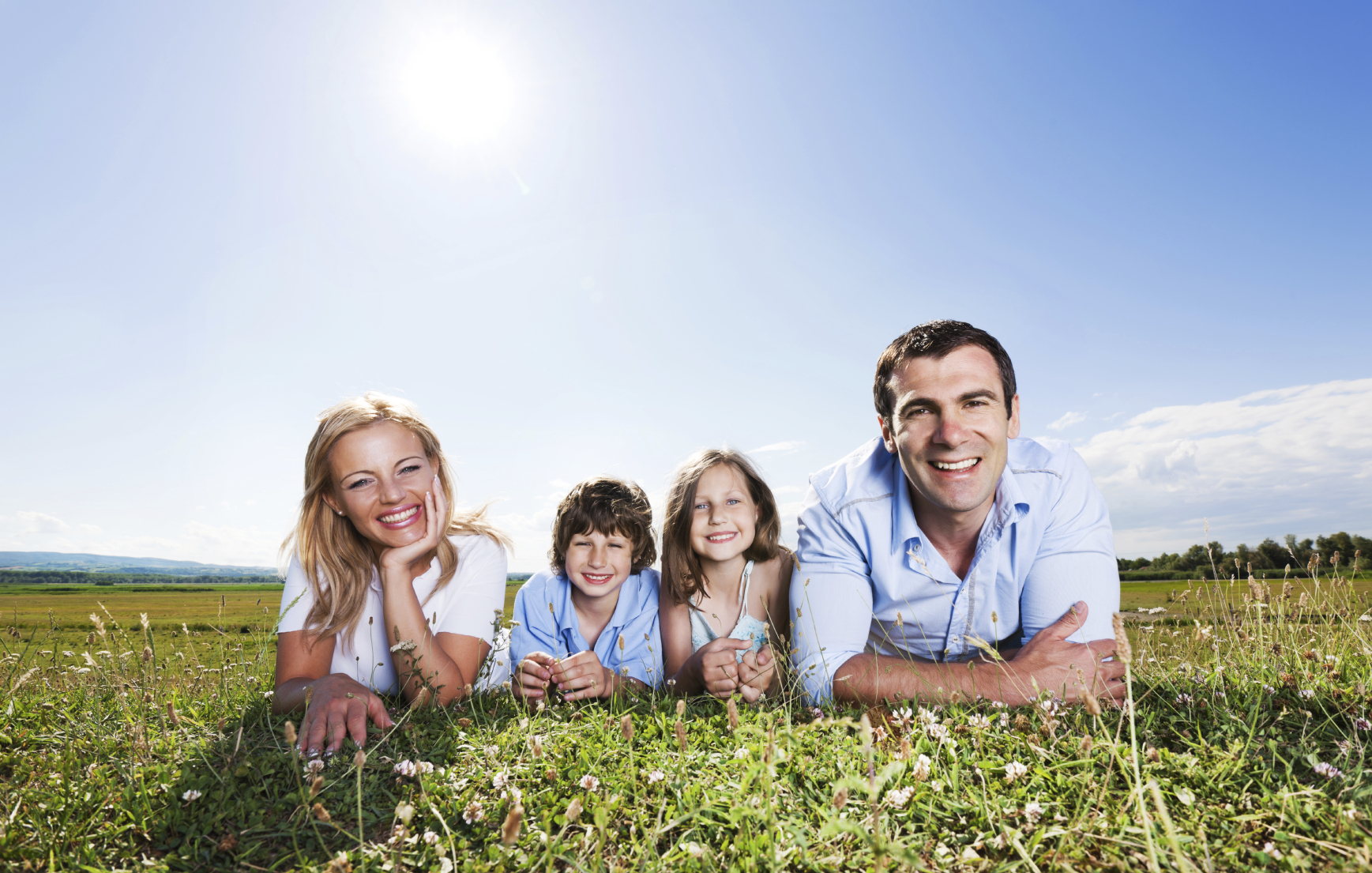 Beautiful family lying on the grass and enjoying in the nature. They are looking at the camera. 

[url=http://www.istockphoto.com/search/lightbox/9786778][img]http://dl.dropbox.com/u/40117171/family.jpg[/img][/url]

[url=http://www.istockphoto.com/search/lightbox/9786750][img]http://dl.dropbox.com/u/40117171/summer.jpg[/img][/url]