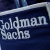The logo of Dow Jones Industrial Average stock market index listed company Goldman Sachs (GS) is seen on the clothing of a trader working at the Goldman Sachs stall on the floor of the New York Stock Exchange