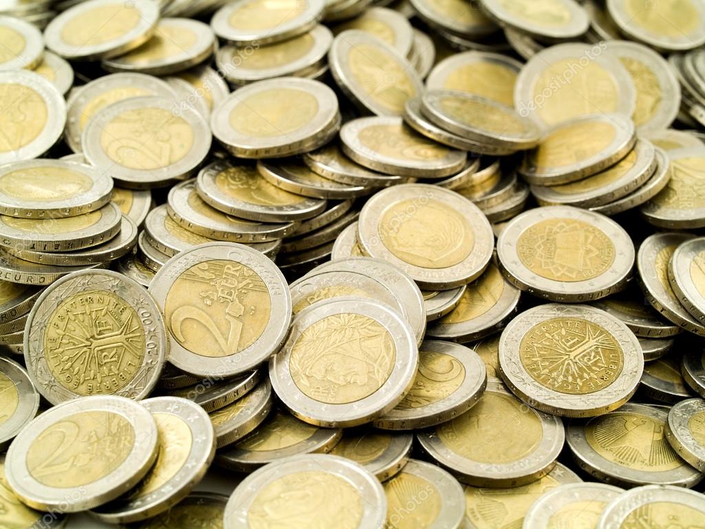 1432287-Female-hands-grabbing-shiny-coins--Stock-Photo